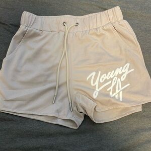 YOUNGLA workout shorts Size M
Never worn